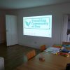 Projection screen in living room for event in April 2014